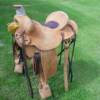 This saddle was made for a nice customer in Cochrane Alberta. Built on 16 inch Association tree with ¾ plate double rigging, rough out leather, and inlaid patch seat.

